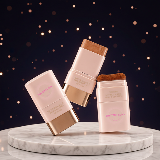 Luna Luxe Foundation Stick - improved hero shot on marble pedestal showing all three positions against midnight navy celestial backdrop