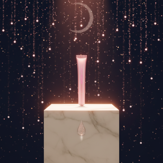 Luna Luxe All-Natural Lip Oil - improved hero shot of single pink tube on marble pedestal with glistening oil drop, radiant halo glow in warm rose and gold against midnight navy backdrop